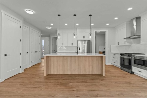 263 Kinniburgh Loop, Chestermere, AB - Indoor Photo Showing Kitchen With Stainless Steel Kitchen With Upgraded Kitchen