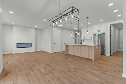 263 Kinniburgh Loop, Chestermere, AB - Indoor Photo Showing Other Room