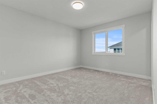 263 Kinniburgh Loop, Chestermere, AB - Indoor Photo Showing Other Room