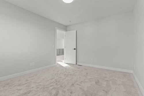263 Kinniburgh Loop, Chestermere, AB - Indoor Photo Showing Other Room