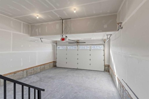 263 Kinniburgh Loop, Chestermere, AB - Indoor Photo Showing Garage