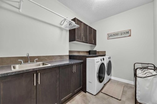 143 Cranarch Crescent Se, Calgary, AB - Indoor Photo Showing Laundry Room