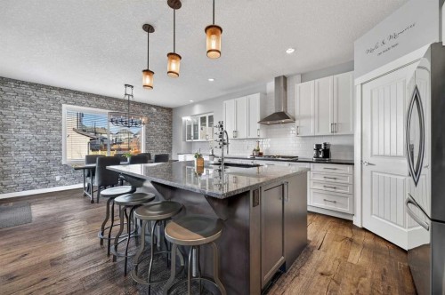 143 Cranarch Crescent Se, Calgary, AB - Indoor Photo Showing Kitchen With Upgraded Kitchen