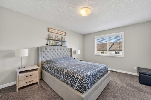 143 Cranarch Crescent Se, Calgary, AB - Indoor Photo Showing Bedroom
