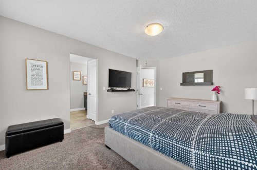 143 Cranarch Crescent Se, Calgary, AB - Indoor Photo Showing Bedroom