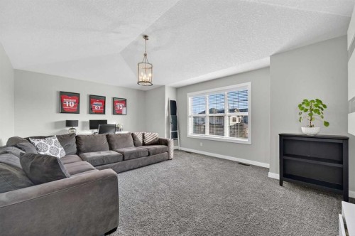 143 Cranarch Crescent Se, Calgary, AB - Indoor Photo Showing Living Room