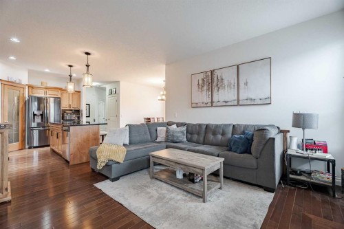 2937 Prairie Springs Grove Sw, Airdrie, AB - Indoor Photo Showing Living Room