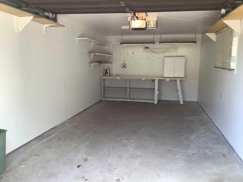 91 Edgehill Drive Nw, Calgary, AB - Indoor Photo Showing Garage