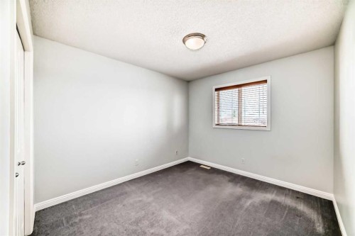 234 Panatella Boulevard Nw, Calgary, AB - Indoor Photo Showing Other Room
