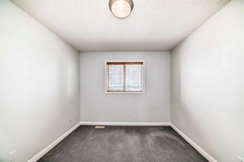 234 Panatella Boulevard Nw, Calgary, AB - Indoor Photo Showing Other Room