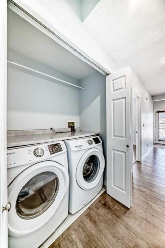234 Panatella Boulevard Nw, Calgary, AB - Indoor Photo Showing Laundry Room