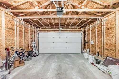 234 Panatella Boulevard Nw, Calgary, AB - Indoor Photo Showing Garage