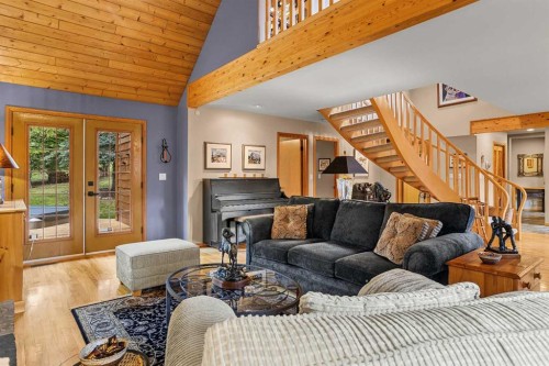 216 Bow River Drive, Harvie Heights, AB - Indoor Photo Showing Living Room With Fireplace