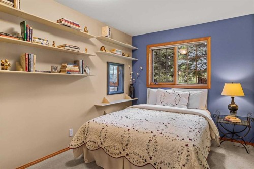 216 Bow River Drive, Harvie Heights, AB - Indoor Photo Showing Bedroom