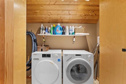 216 Bow River Drive, Harvie Heights, AB - Indoor Photo Showing Laundry Room