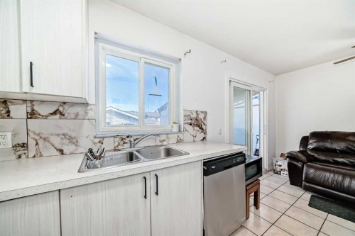 104 Falmere Way Ne, Calgary, AB - Indoor Photo Showing Kitchen With Double Sink