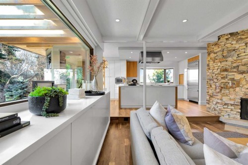1707 Suffolk Street Sw, Calgary, AB - Indoor Photo Showing Living Room With Fireplace