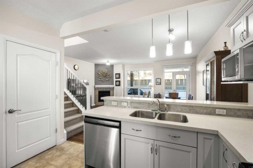 156 Royal Manor Nw, Calgary, AB - Indoor Photo Showing Kitchen With Double Sink