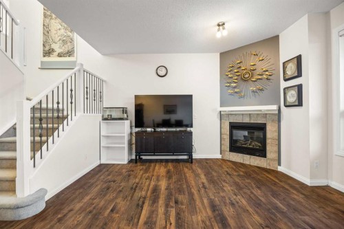 156 Royal Manor Nw, Calgary, AB - Indoor Photo Showing Living Room With Fireplace