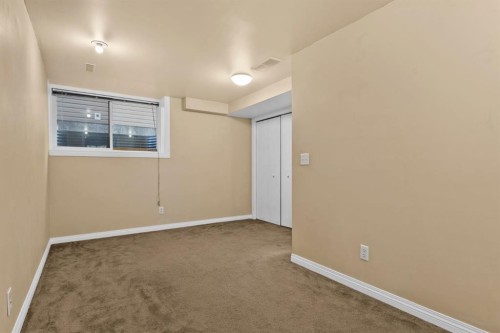 4416 Quentin Court Sw, Calgary, AB - Indoor Photo Showing Other Room