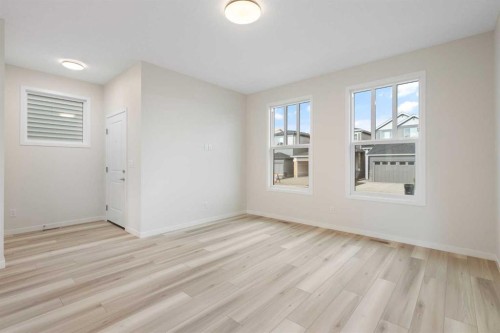 680 Buffaloberry Manor Se, Calgary, AB - Indoor Photo Showing Other Room