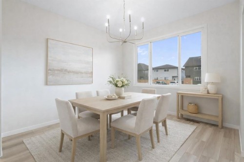 680 Buffaloberry Manor Se, Calgary, AB - Indoor Photo Showing Dining Room