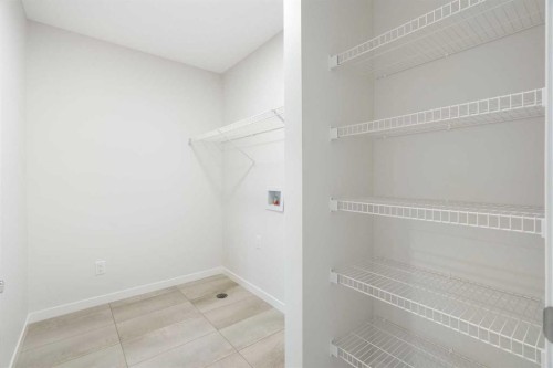 680 Buffaloberry Manor Se, Calgary, AB - Indoor With Storage