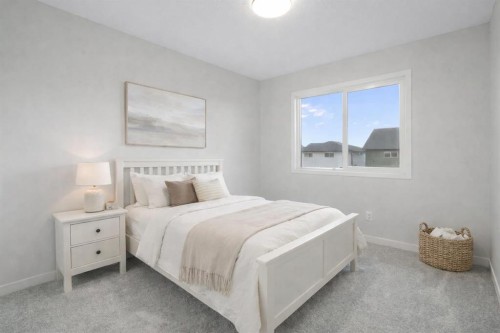 680 Buffaloberry Manor Se, Calgary, AB - Indoor Photo Showing Bedroom