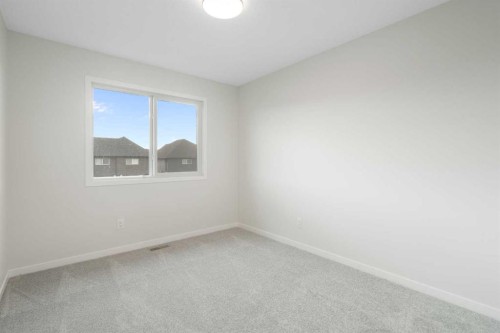 680 Buffaloberry Manor Se, Calgary, AB - Indoor Photo Showing Other Room