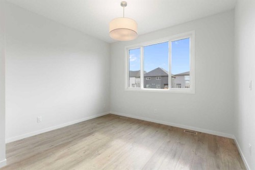 688 Buffaloberry Manor Se, Calgary, AB - Indoor Photo Showing Other Room