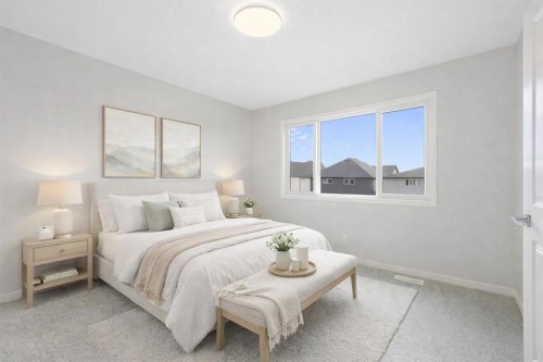 688 Buffaloberry Manor Se, Calgary, AB - Indoor Photo Showing Bedroom