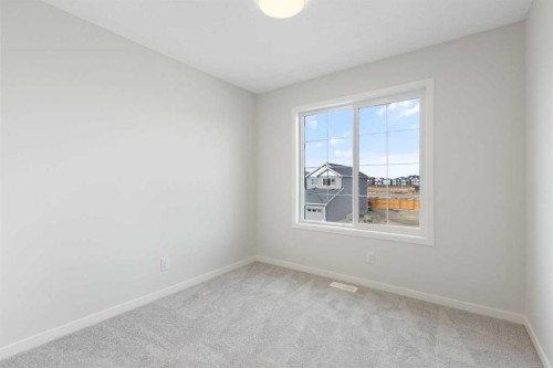 688 Buffaloberry Manor Se, Calgary, AB - Indoor Photo Showing Other Room