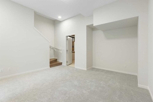 688 Buffaloberry Manor Se, Calgary, AB - Indoor Photo Showing Other Room