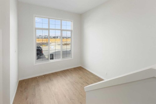 688 Buffaloberry Manor Se, Calgary, AB - Indoor Photo Showing Other Room