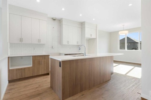 688 Buffaloberry Manor Se, Calgary, AB - Indoor Photo Showing Kitchen