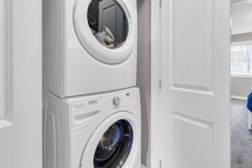 594 Hillcrest Road Sw, Airdrie, AB - Indoor Photo Showing Laundry Room