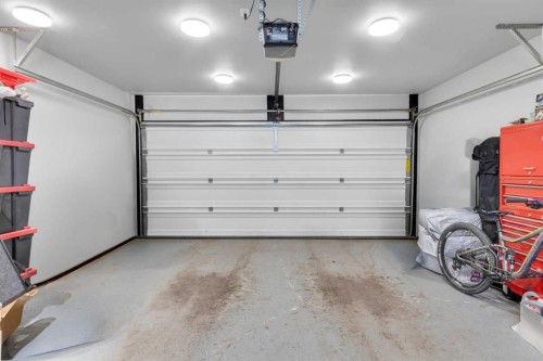 594 Hillcrest Road Sw, Airdrie, AB - Indoor Photo Showing Garage