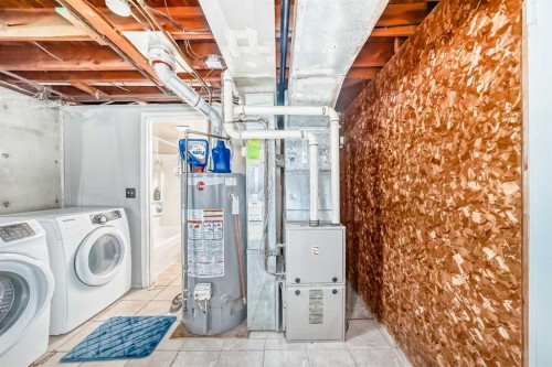 627 Fortalice Crescent Se, Calgary, AB - Indoor Photo Showing Laundry Room