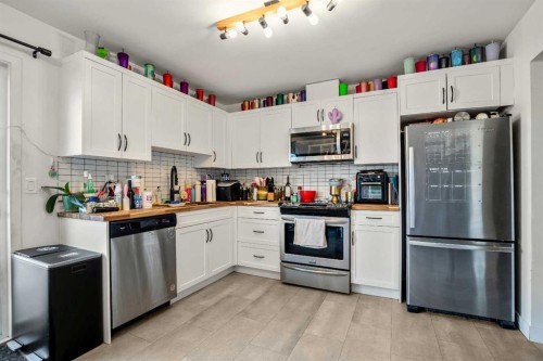 1986 Cottonwood Crescent Se, Calgary, AB - Indoor Photo Showing Kitchen With Stainless Steel Kitchen
