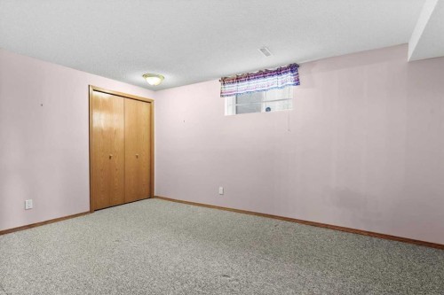 222 Arbour Cliff Close Nw, Calgary, AB - Indoor Photo Showing Other Room