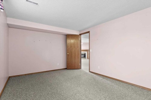 222 Arbour Cliff Close Nw, Calgary, AB - Indoor Photo Showing Other Room
