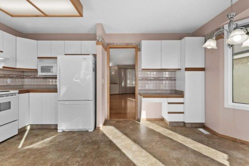 222 Arbour Cliff Close Nw, Calgary, AB - Indoor Photo Showing Kitchen
