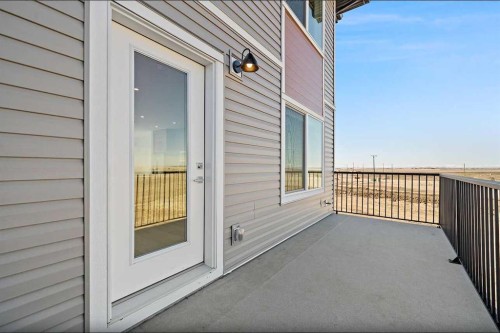 703-280 Chelsea Road, Chestermere, AB - Outdoor With Exterior