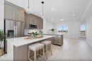 703-280 Chelsea Road, Chestermere, AB  - Indoor Photo Showing Kitchen With Stainless Steel Kitchen With Upgraded Kitchen 