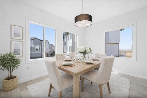 703-280 Chelsea Road, Chestermere, AB - Indoor Photo Showing Dining Room