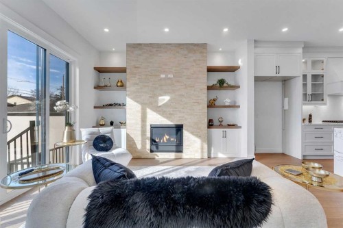 4525 20 Avenue Nw, Calgary, AB - Indoor Photo Showing Living Room With Fireplace