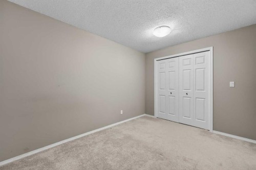 201 Saddlecrest Way Ne, Calgary, AB - Indoor Photo Showing Other Room