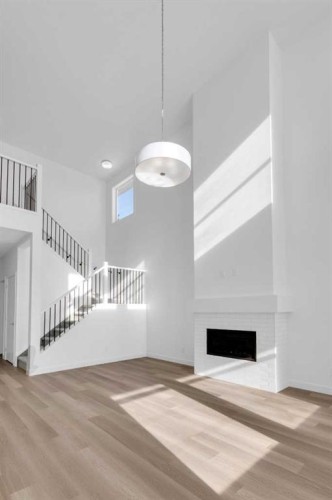140 Copperhead Road Se, Calgary, AB - Indoor With Fireplace