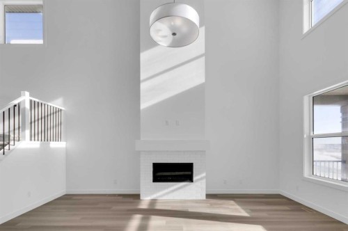 140 Copperhead Road Se, Calgary, AB - Indoor With Fireplace