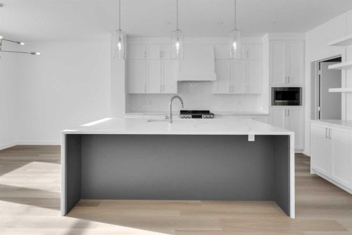 140 Copperhead Road Se, Calgary, AB - Indoor Photo Showing Kitchen With Upgraded Kitchen